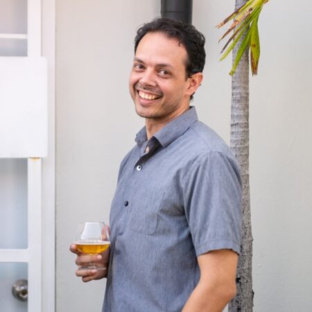 Francisco Santana holding a beer